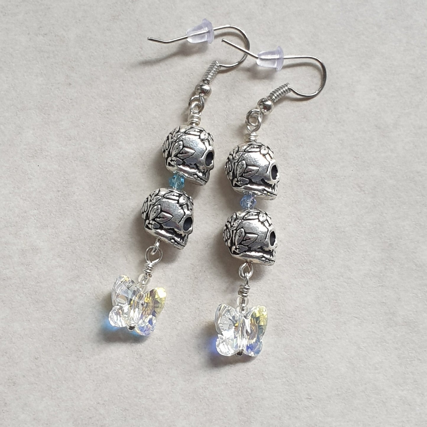 Metallic Sugar Skull and Czech Glass Butterfly earrings