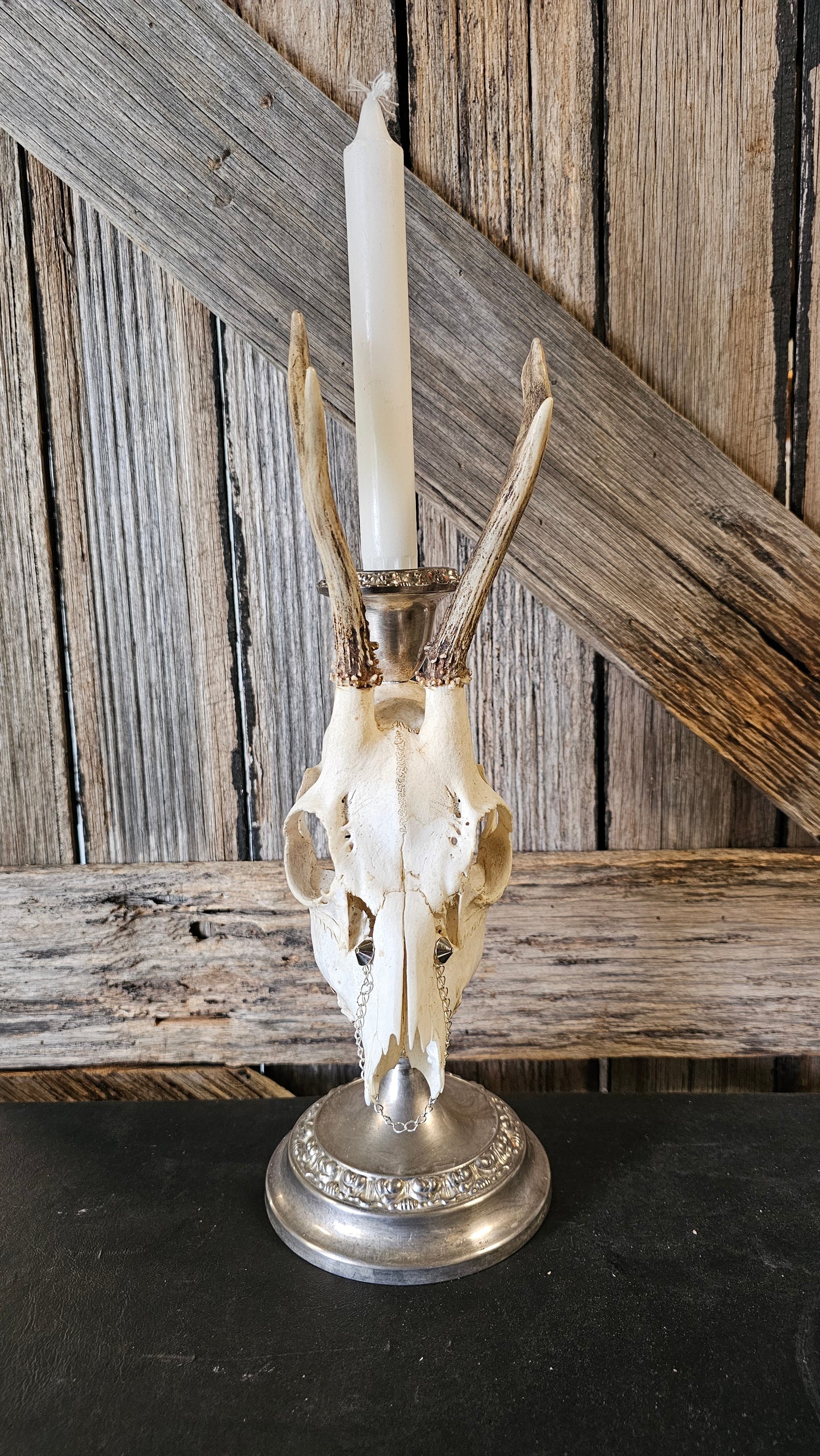 Candle holder - real skull on vintage candle stick