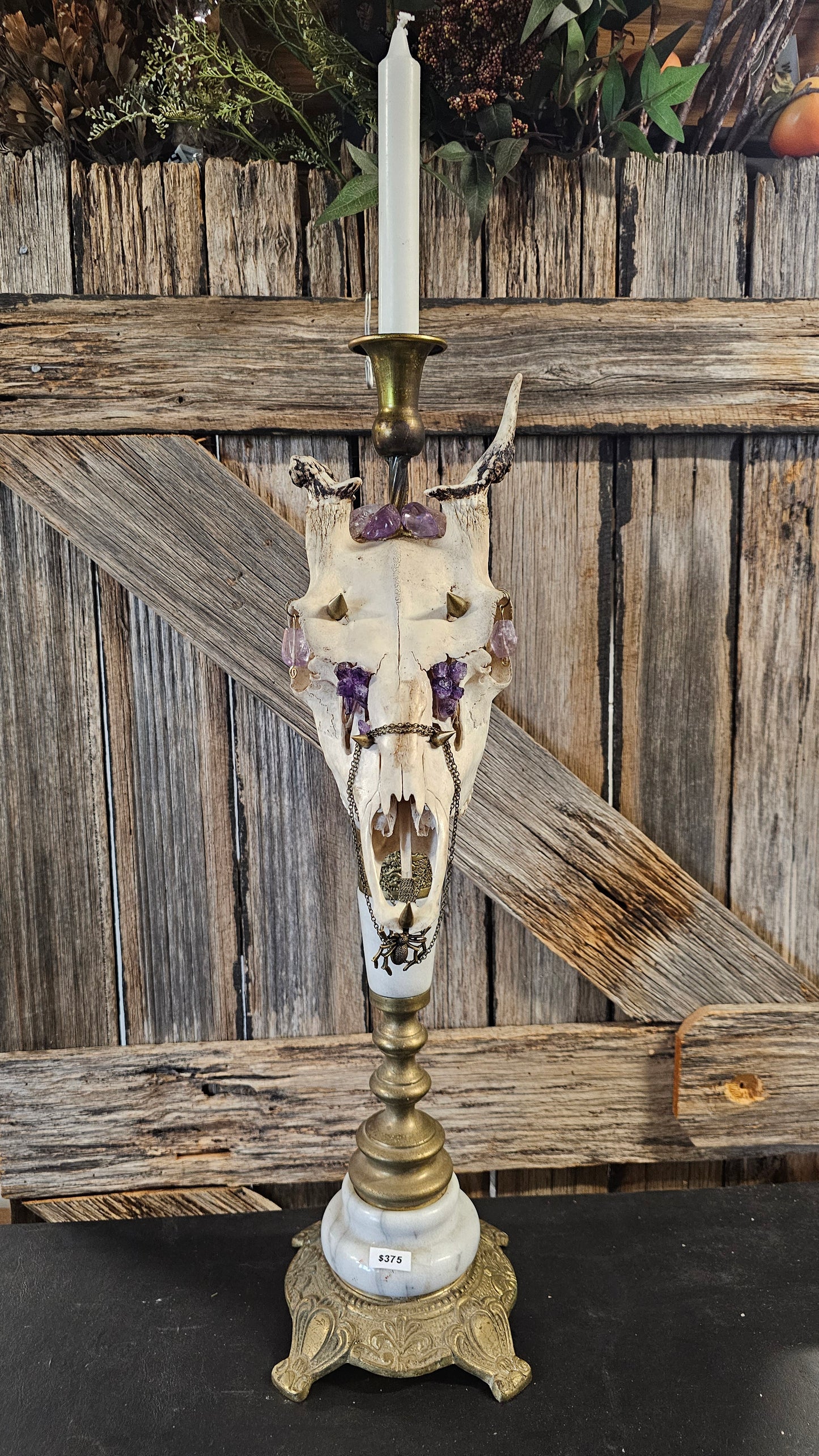 Candle holder - real skull on vintage candle stick
